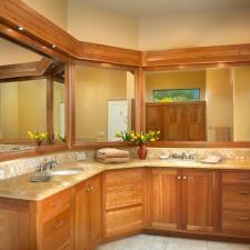 Traditional Master Bathroom with light wood framed vanity mirrors