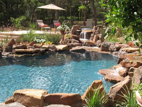 Traditional Pool with high end pool