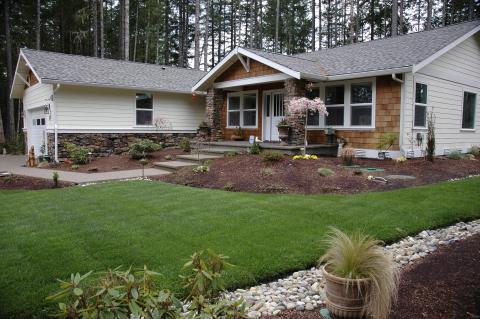 Traditional Home Exterior with white framed windows and door