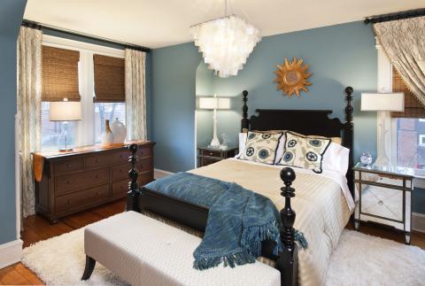 Eclectic Bedroom with blue and ivory bed linens