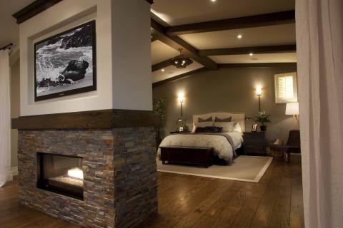 Contemporary Bedroom with dark wood ceiling beams