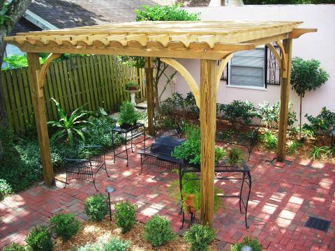 Traditional Patio with black iron furniture