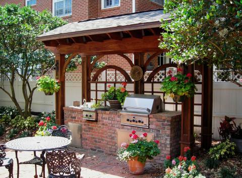 Traditional Patio with black iron patio furniture