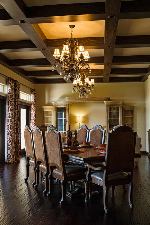 Traditional Dining Room with built in china hutch with crown moulding