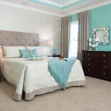 Transitional Bedroom with light gray upholstered head board