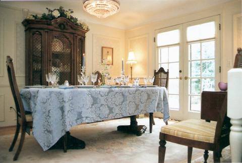 Traditional Dining Room with low profile crystal chandelier