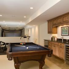 Traditional Basement with black felt top on pool table
