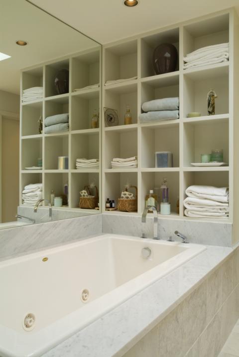 Transitional Bathroom with marble tile tub surround