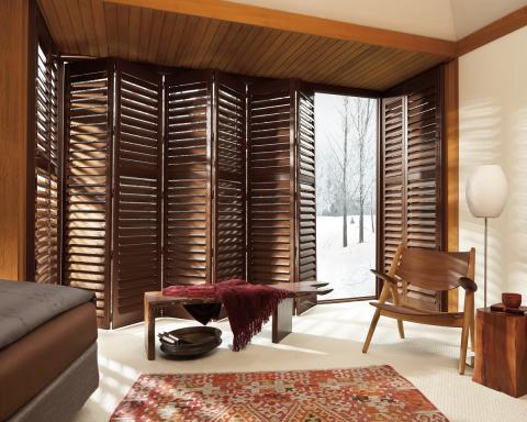 Contemporary Bedroom with wood ceiling panels around window