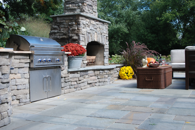 Traditional Outdoor Kitchen with dark brown outdoor patio furniture
