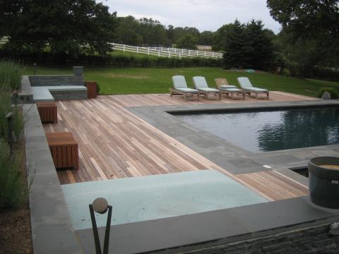 Modern Pool with light blue chair cushions