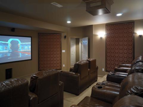 Traditional Home Theater with red brocade wall paper wall detail