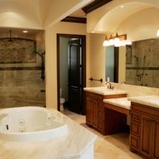 Transitional Master Bathroom with large wall mounted vanity mirror