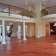 Traditional Family Room with second story balcony