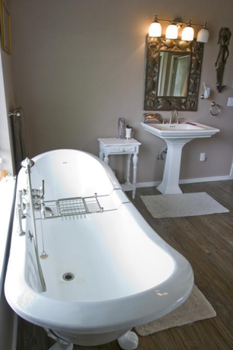 Eclectic Bathroom with metal unique framed mirror