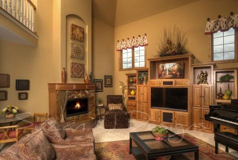 Traditional Family Room with black wood coffee table with glass panel top
