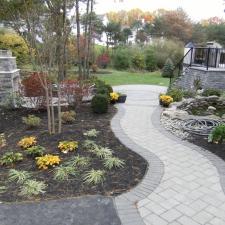 Transitional Landscape with stone brick patio steps