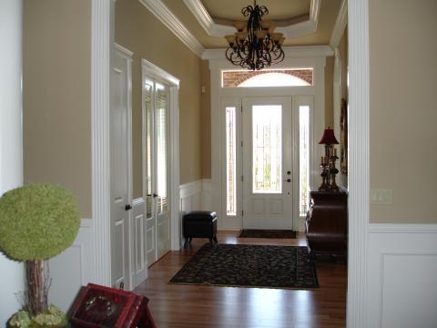 Traditional Entry with window above and around door