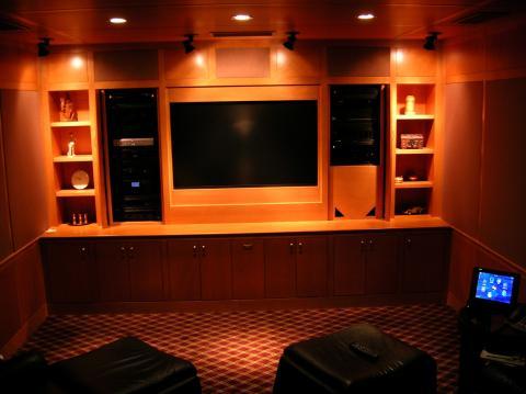 Contemporary Home Theater with custom wood media cabinet
