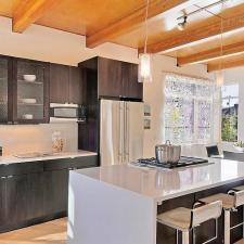 Modern Kitchen with metal and black dining table and chairs