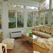Traditional Sunroom with wicker furniture