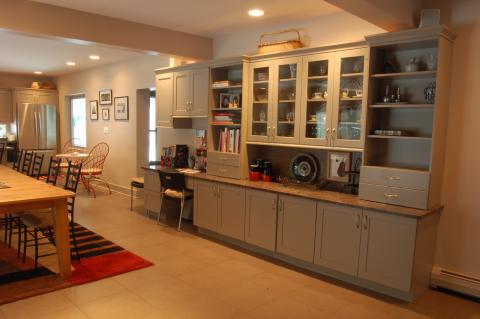 Eclectic Dining Room with glass front cabinet doors