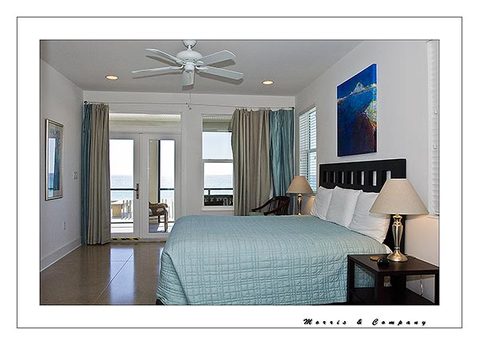 Contemporary Bedroom with dark cherry end table