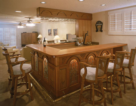 Traditional Basement with built in wine glass storage