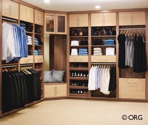 Contemporary Closet with light blue throw pillows