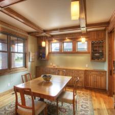 Traditional Dining Room with glass and wood door