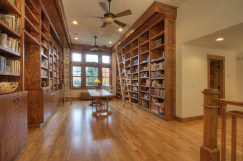 Traditional Library with custom full wall book cases