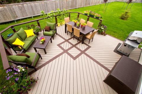 Contemporary Patio with metal and wood deck railing