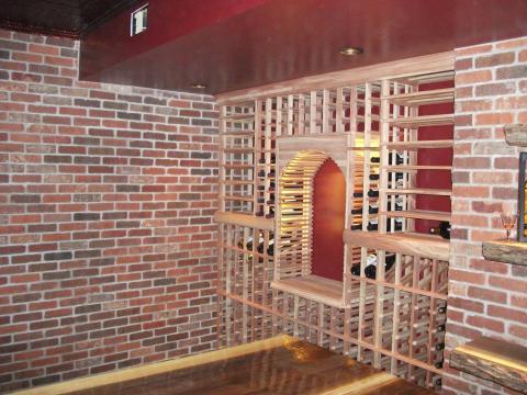 Traditional Wine Cellar with built in wine storage wall