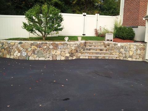Modern Landscape with low stone retaining wall