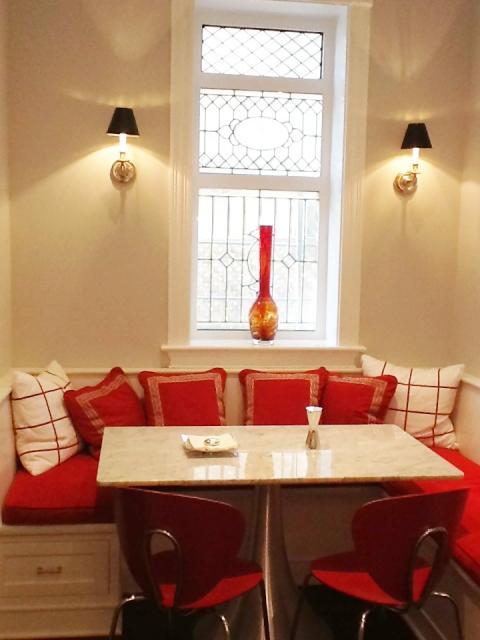 Contemporary Dining Room with granite top kitchen table