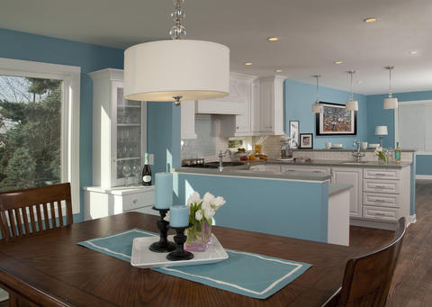 Transitional Dining Room with glass front cabinet door