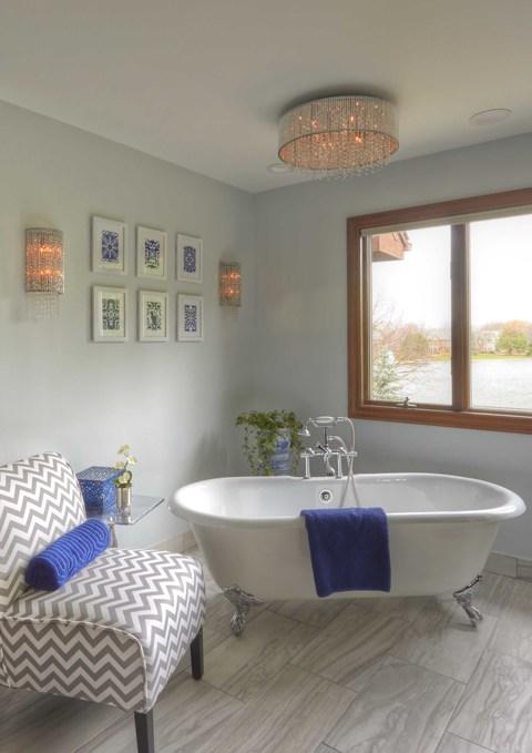 Eclectic Bathroom with clawfoot free standing porcelain bathtub