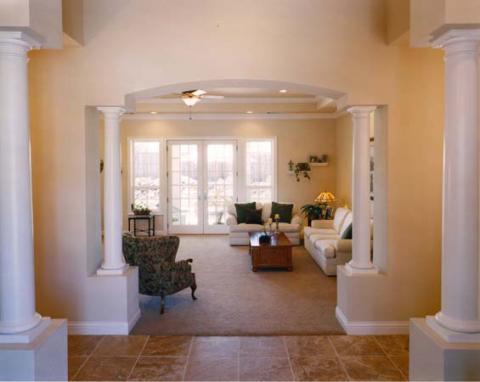 Traditional Family Room with large doorway with built in columns