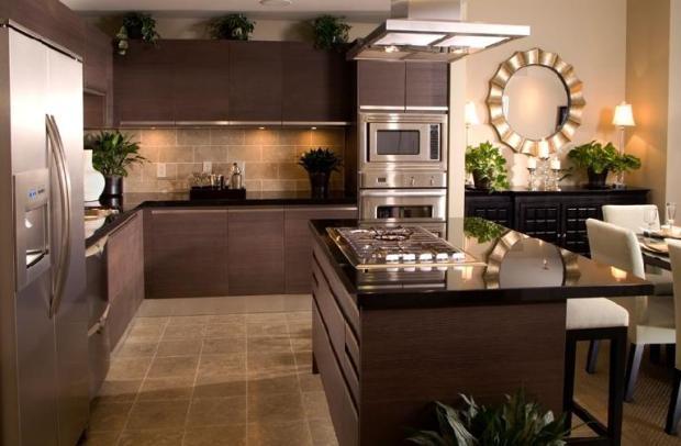 Modern Kitchen with kitchen island with range built in