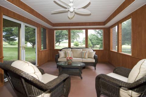 Traditional Sunroom with blue red orange yellow green brown stripes