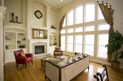 Traditional Living Room with stone fireplace surround