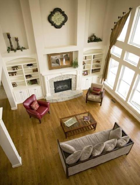 Traditional Family Room with medium wood coffee table with glass top