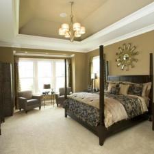 Transitional Bedroom with bedside table lamps with tan shades