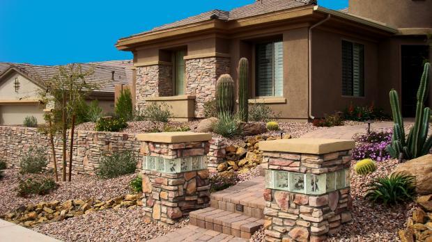 Southwestern Home Exterior In Phoenix Cast Concrete Casement Southwestern Home Exterior With Stone Brick Pillar Glass Block Accent
