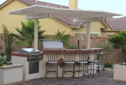 Traditional Outdoor Kitchen with stainless steel outdoor grill