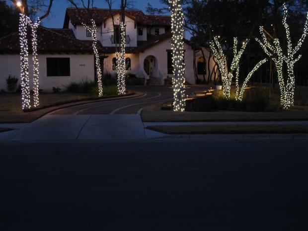 Southwestern Home Exterior with small tall grasses lining home