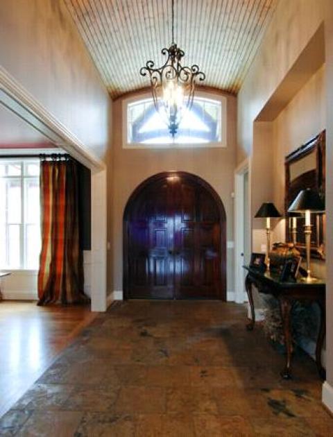 Traditional Entry with light plank wood ceiling covering
