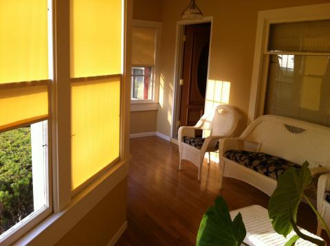 Traditional Sunroom with front door with oval glass panel