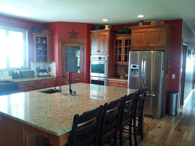 Rustic Kitchen In Kennesaw Red Painted Walls Wood Cabinets By