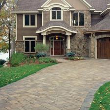 Traditional Driveway with painted wood shingle siding